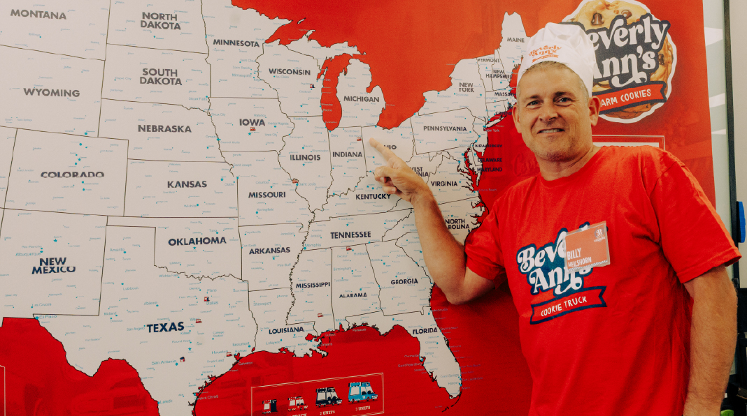Travelin’ Tom’s Coffee Truck franchisee, Wayne Reese, smiles at customers