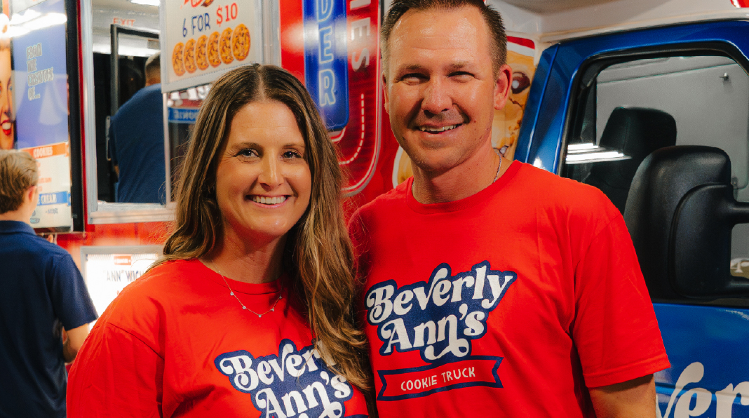 Travelin’ Tom’s Coffee Truck franchise owners Leann and Greg Hammond point to their franchise location on a map