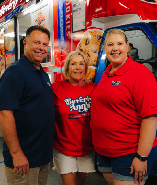 Travelin’ Tom’s namesake, Tom Lamb, smiles while talking with a Travelin’ Tom’s Coffee Truck franchisee